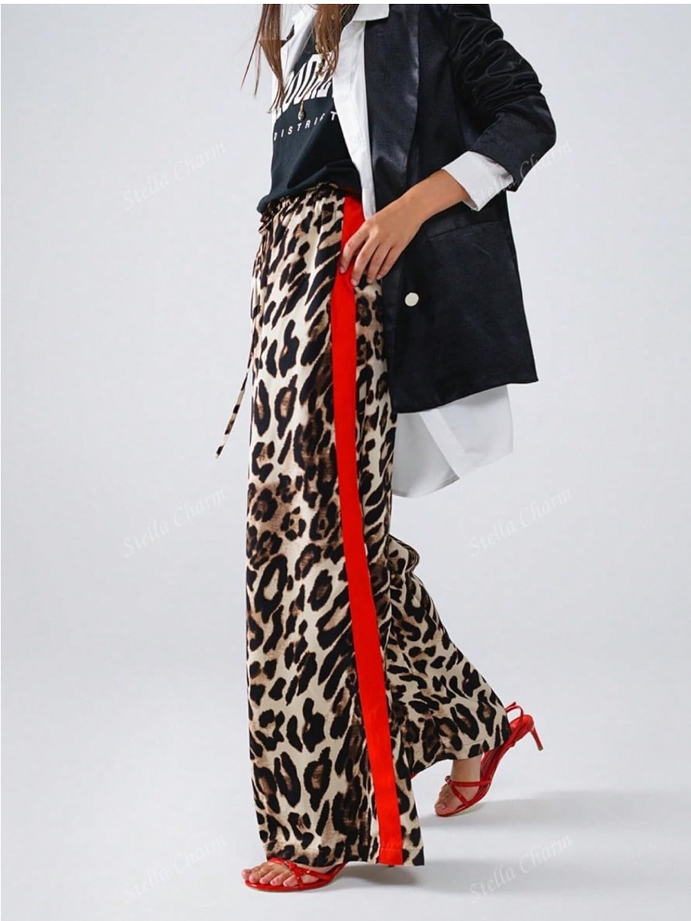 Leopard print wide leg pants with red stripe. NWOT